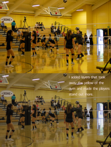 Volleyball players on a court.