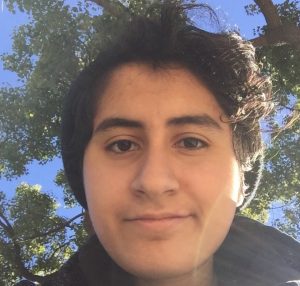An image of myself, I have dark eyes and dark wavy hair