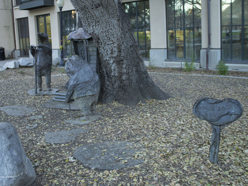 The sculpture "Toad's Book Club", inspired by "The Wind in the Willows", adjacent to the library in Pioneer Park.