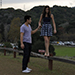 Another shot from the music video: Shayda and Stefano walking together through a meadow.