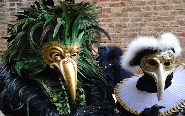 Masked Venetians at the carnival