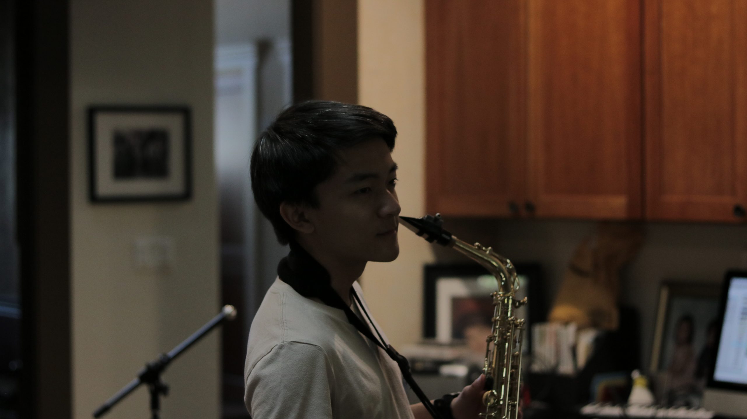 This is Jonathan. He is holding a sax.
