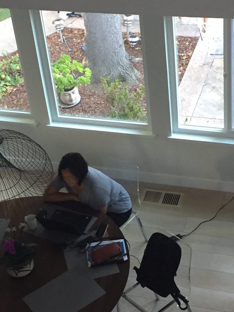 This is a picture of my mom working. I think she works an unnecessary amount of time.