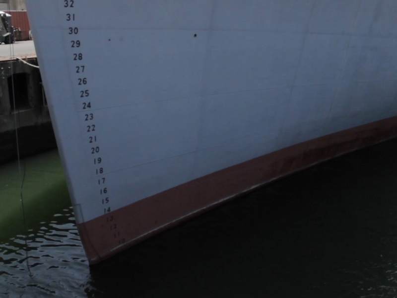 Markers on the hull of the Red Oak Victory depict water depth.