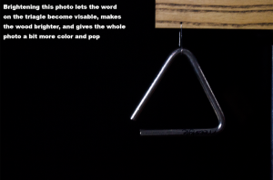A close up of a metal triangle.